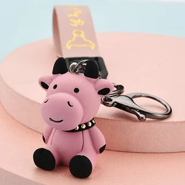 Cartoon-Kuh-Schlüsselanhänger aus rosafarbener Aluminiumlegierung